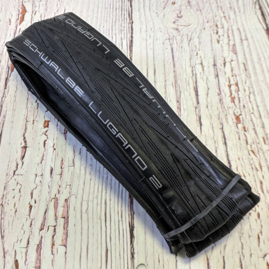 Покрышка для шоссейного велосипеда Schwalbe Lugano II 700x25 складная