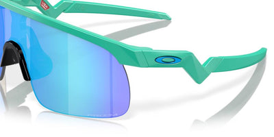Oakley Resistor Genç Güneş Gözlüğü J901019 Matte Celeste Prizm Sapphire
